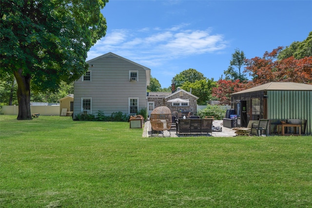 5 Fox Rd, Middle Island, NY 11953 - rear view of property with a patio area and an outdoor living space