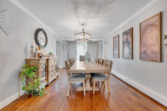 5 Fox Rd, Middle Island, NY 11953 - dining room with a chandelier, wood finished floors, and crown molding