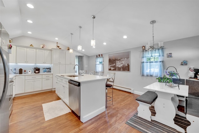 5 Fox Rd, Middle Island, NY 11953 - kitchen featuring a baseboard heating unit, dishwasher, recessed lighting, plenty of natural light, and vaulted ceiling