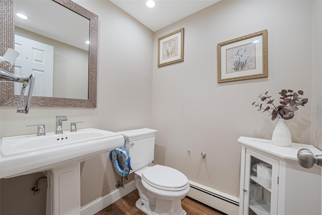 5 Fox Rd, Middle Island, NY 11953 - bathroom with a baseboard radiator, wood finished floors, and recessed lighting