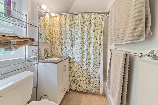 313 Concord Rd, Yonkers, NY 10710 - bathroom with vanity and shower / bath combo with shower curtain