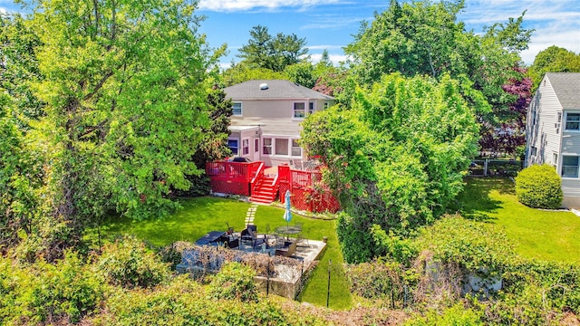 313 Concord Rd, Yonkers, NY 10710 - view of grassy yard featuring a deck, stairs, and a patio