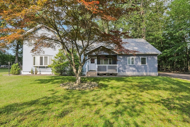 28 Nob Hill Rd, New City, NY 10956 - view of front of house featuring a porch and a front lawn