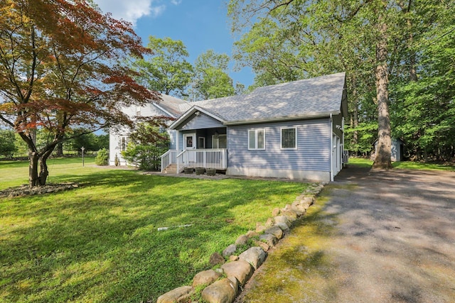 28 Nob Hill Rd, New City, NY 10956 - view of front of property featuring a front lawn and a shingled roof
