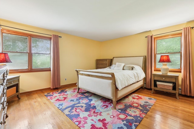 28 Nob Hill Rd, New City, NY 10956 - bedroom with multiple windows and light wood finished floors