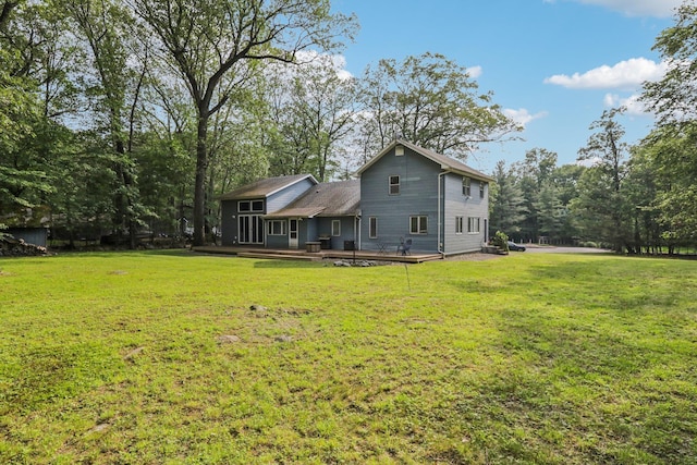 28 Nob Hill Rd, New City, NY 10956 - rear view of house with a lawn and a wooden deck