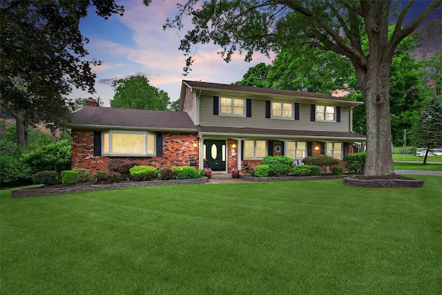 19 Ridgeview Ter, Goshen, NY 10924 - traditional home with a chimney, a yard, and brick siding