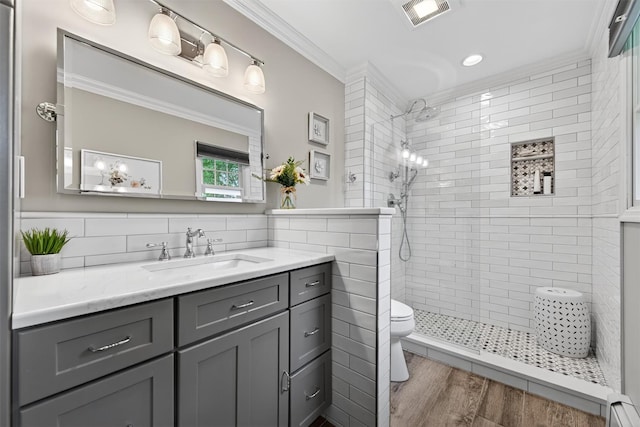 19 Ridgeview Ter, Goshen, NY 10924 - full bathroom featuring vanity, a walk in shower, crown molding, a baseboard heating unit, and wood finished floors