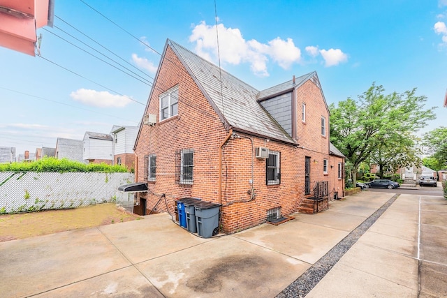 6419 Fitchett St, Rego Park, NY 11374 - view of property exterior featuring brick siding