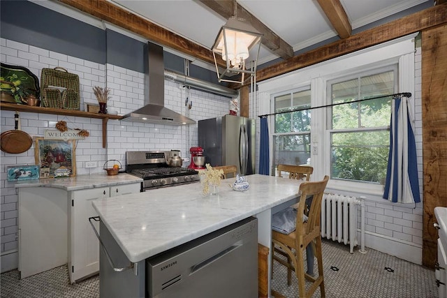 111 S Hamilton St, Poughkeepsie, NY 12601 - kitchen with wall chimney range hood, stainless steel appliances, radiator heating unit, open shelves, and beamed ceiling