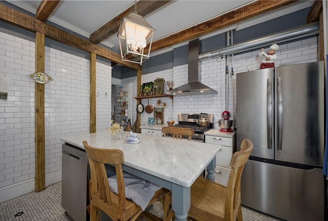 111 S Hamilton St, Poughkeepsie, NY 12601 - kitchen featuring stainless steel appliances, wall chimney exhaust hood, a chandelier, beamed ceiling, and hanging light fixtures