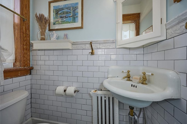 111 S Hamilton St, Poughkeepsie, NY 12601 - bathroom featuring tile walls and radiator heating unit