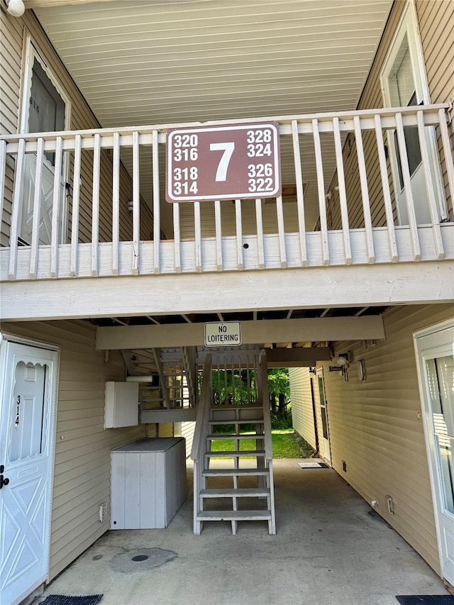 324 Concord Ln, Middletown, NY 10940 - view of car parking featuring a carport and stairs