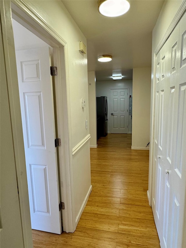 324 Concord Ln, Middletown, NY 10940 - corridor with light wood-style floors and baseboards