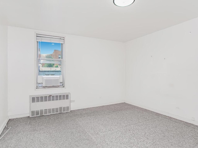 1425 Thieriot Ave Unit 2J, Bronx, NY 10460 - unfurnished room with radiator heating unit, cooling unit, and carpet flooring