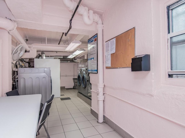 1425 Thieriot Ave Unit 2J, Bronx, NY 10460 - laundry area with tile patterned flooring and baseboards