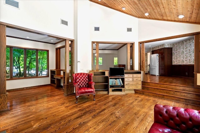205 Radcliff Dr, Nyack, NY 10960 - living area with high vaulted ceiling, wood finished floors, wood ceiling, ornamental molding, and recessed lighting