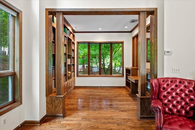 205 Radcliff Dr, Nyack, NY 10960 - sitting room with healthy amount of natural light, wood finished floors, and crown molding