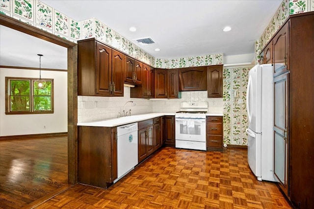 205 Radcliff Dr, Nyack, NY 10960 - kitchen featuring white appliances, wallpapered walls, light countertops, backsplash, and range hood