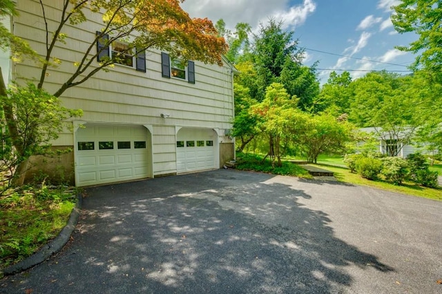 205 Radcliff Dr, Nyack, NY 10960 - view of home's exterior with driveway and a garage