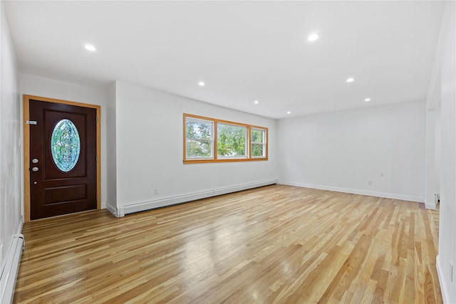 205-06 26th Ave, Bayside, NY 11360 - foyer entrance featuring baseboard heating, a baseboard radiator, light wood-style floors, and recessed lighting