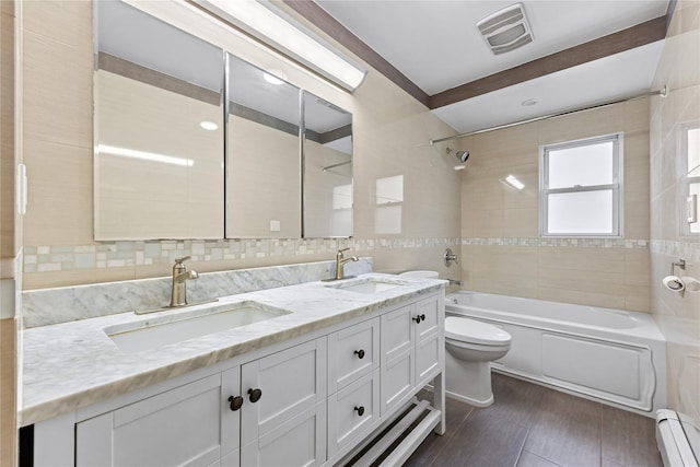 205-06 26th Ave, Bayside, NY 11360 - full bathroom featuring a baseboard radiator, shower / washtub combination, and double vanity