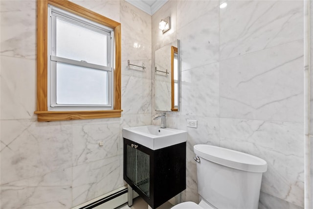 205-06 26th Ave, Bayside, NY 11360 - bathroom with vanity, tile walls, ornamental molding, and a baseboard radiator