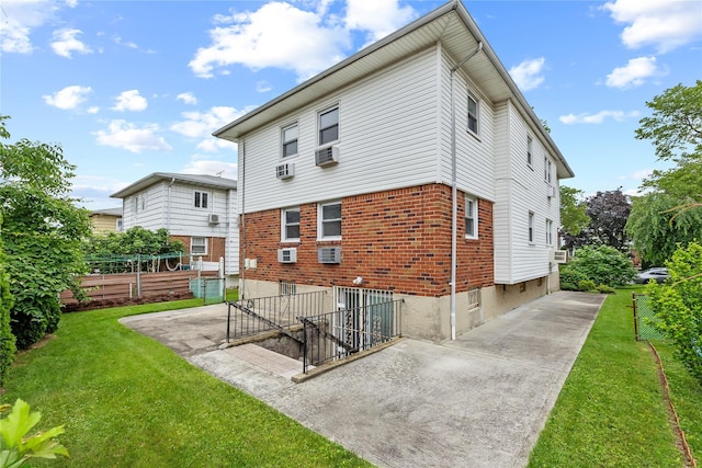 205-06 26th Ave, Bayside, NY 11360 - back of property featuring cooling unit and brick siding