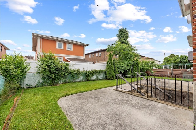 205-06 26th Ave, Bayside, NY 11360 - fenced backyard featuring a patio