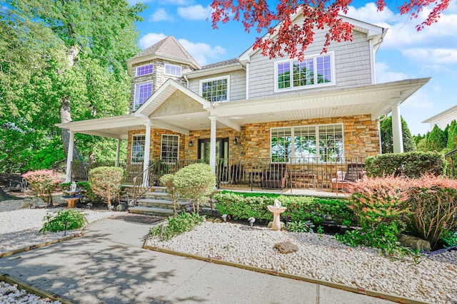 66 Normalee Rd, Staten Island, NY 10305 - view of front of house with covered porch and stone siding