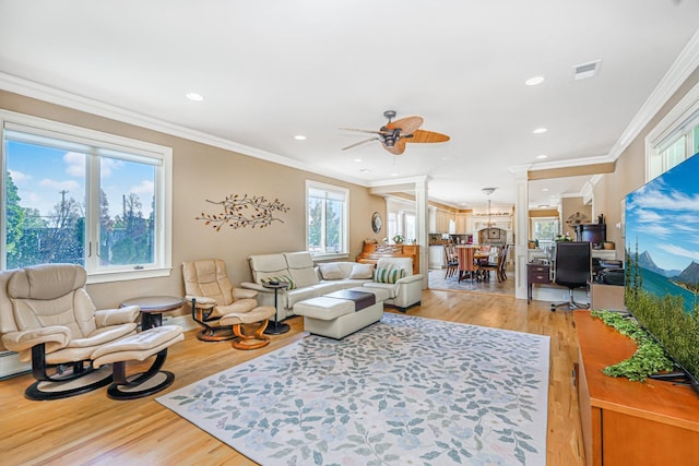 66 Normalee Rd, Staten Island, NY 10305 - living area featuring light wood-style flooring, ornate columns, ceiling fan, crown molding, and recessed lighting