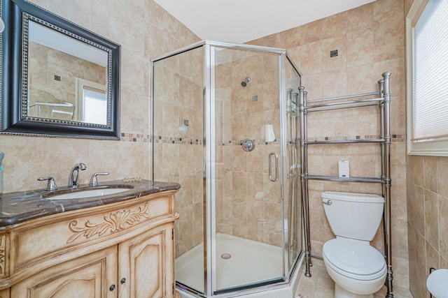 66 Normalee Rd, Staten Island, NY 10305 - full bath featuring tile walls, vanity, and a shower stall