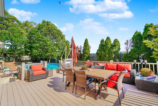 66 Normalee Rd, Staten Island, NY 10305 - wooden terrace with an outdoor pool, outdoor dining area, and an outdoor living space