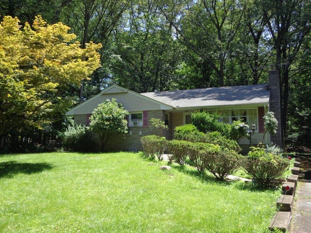 286 Spook Rock Rd, Suffern, NY 10901 - view of front of house featuring a front yard and a chimney