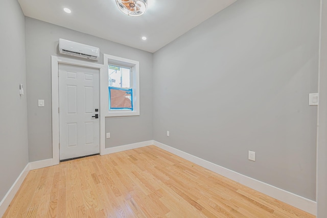 610 Sheffield Ave, Brooklyn, NY 11207 - entryway featuring a wall mounted AC, light wood-type flooring, and recessed lighting