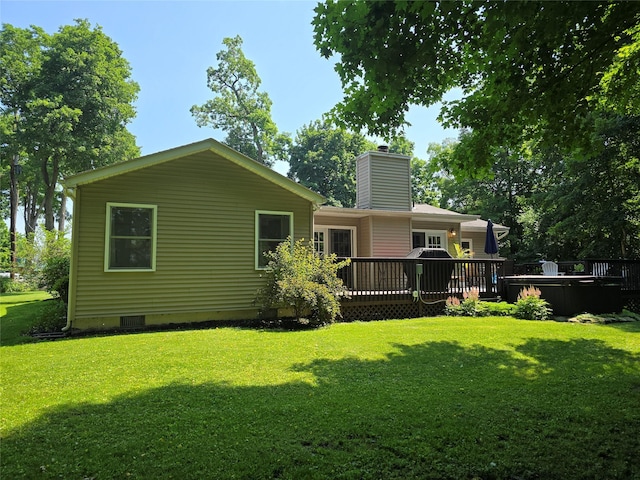 18 Division St, Cornwall, NY 12518 - rear view of property featuring crawl space, a chimney, a yard, and a deck