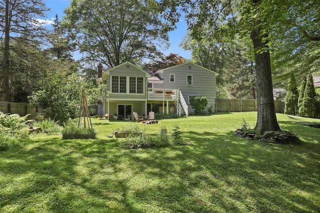 1 Orchard Dr, South Salem, NY 10590 - rear view of property with stairway, a fenced backyard, a wooden deck, and a chimney