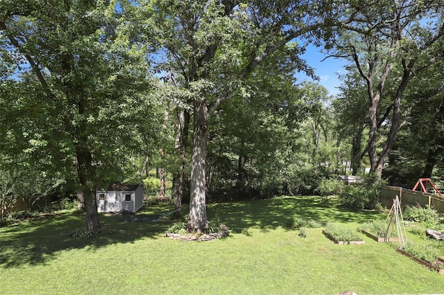 1 Orchard Dr, South Salem, NY 10590 - view of green lawn with a storage unit