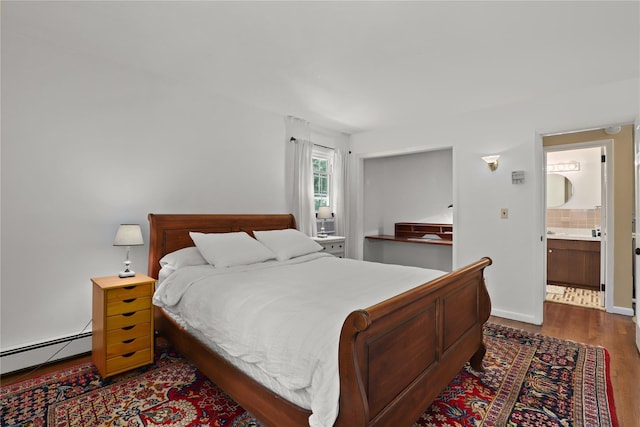 1 Orchard Dr, South Salem, NY 10590 - bedroom featuring dark wood-style flooring and a baseboard heating unit