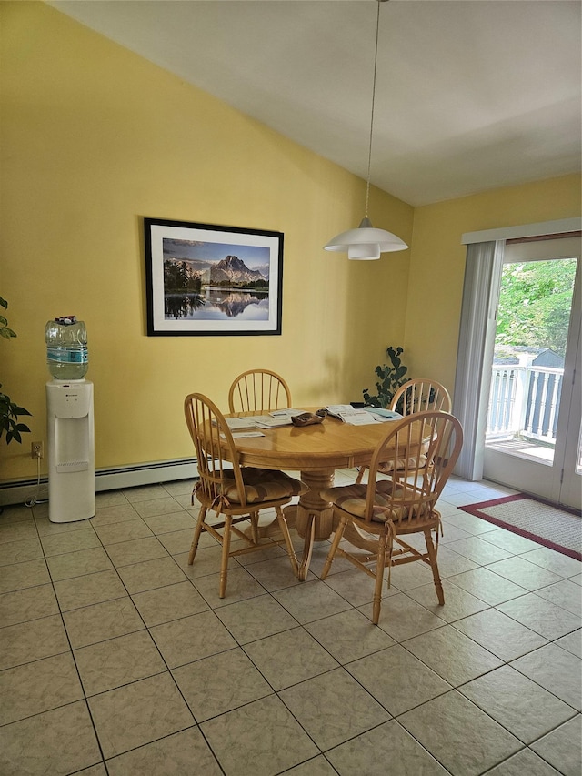 215 Sycamore Dr, New Windsor, NY 12553 - dining space with lofted ceiling, a baseboard heating unit, and light tile patterned floors