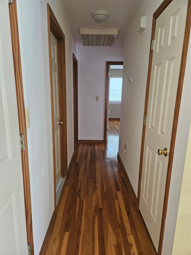 215 Sycamore Dr, New Windsor, NY 12553 - corridor featuring dark wood-style flooring and baseboards