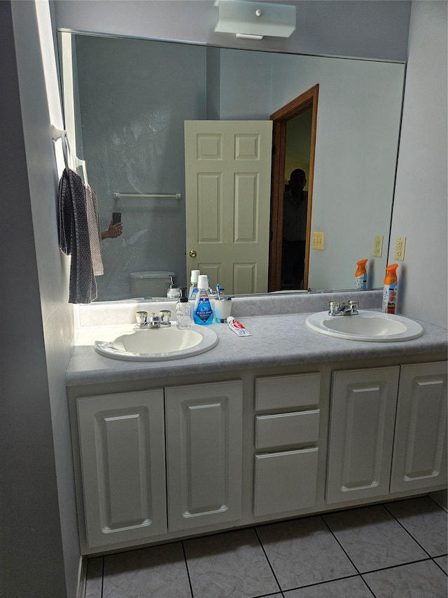 215 Sycamore Dr, New Windsor, NY 12553 - bathroom featuring double vanity and tile patterned floors