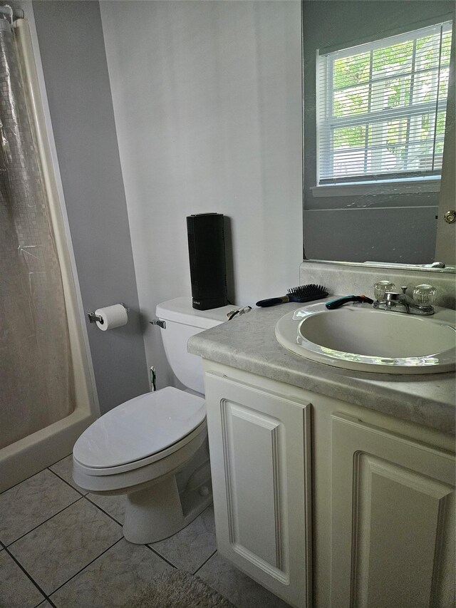 215 Sycamore Dr, New Windsor, NY 12553 - bathroom with vanity, tile patterned floors, and a shower with curtain