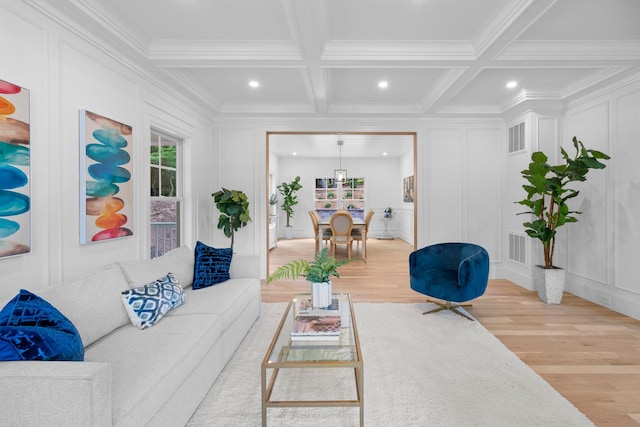 32 Middleville Rd Unit 2, Northport, NY 11768 - living area featuring a decorative wall, wood finished floors, crown molding, and recessed lighting