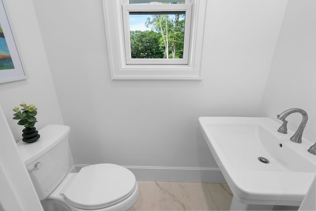 32 Middleville Rd Unit 2, Northport, NY 11768 - bathroom with marble finish floors and a sink