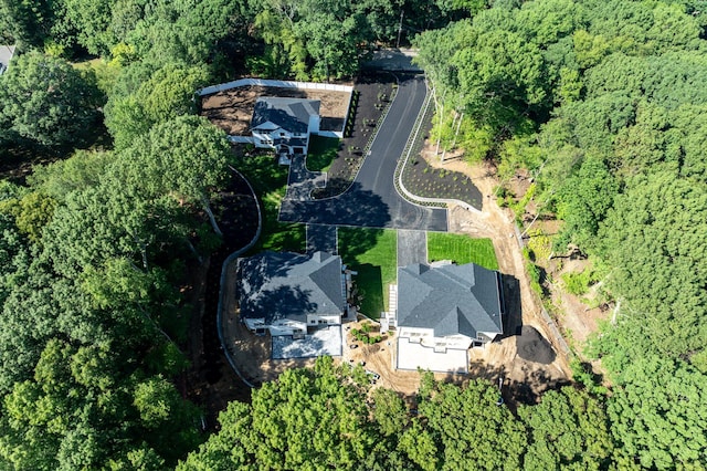 32 Middleville Rd Unit 2, Northport, NY 11768 - aerial view of property and surrounding area featuring a forest