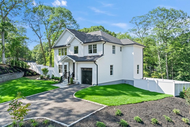 30 Middleville Rd, Northport, NY 11768 - traditional-style house featuring a garage, driveway, a shingled roof, and a gate