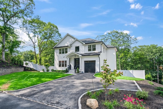 30 Middleville Rd, Northport, NY 11768 - view of front of house featuring an attached garage and driveway