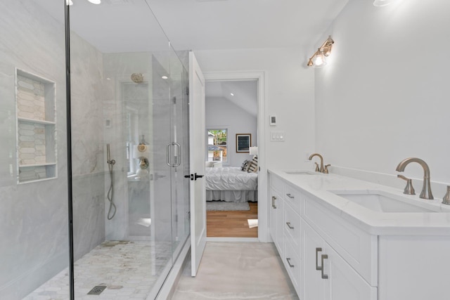 30 Middleville Rd, Northport, NY 11768 - full bathroom featuring a shower stall, ensuite bath, lofted ceiling, and double vanity