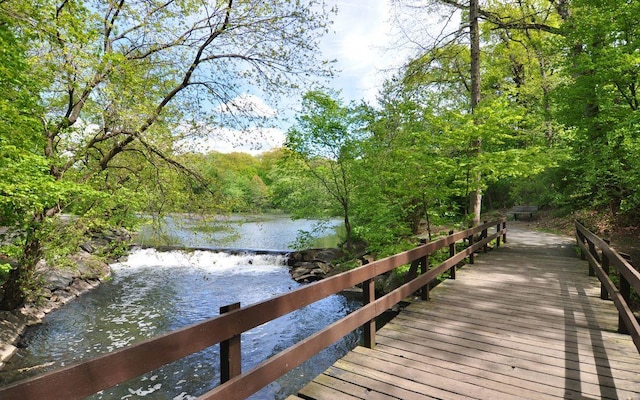 26 Pondfield Rd W Unit 2A, Bronxville, NY 10708 - dock with a water view and a forest view
